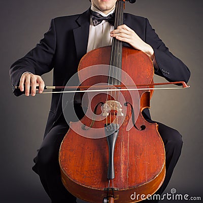 Cellist playing on cello Stock Photo