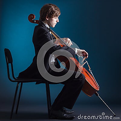 Cellist playing on cello Stock Photo