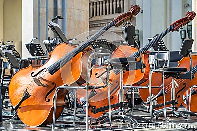 Cello classical instrument on an empty stage. Stock Photo