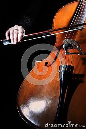 Cello hands with bow Stock Photo
