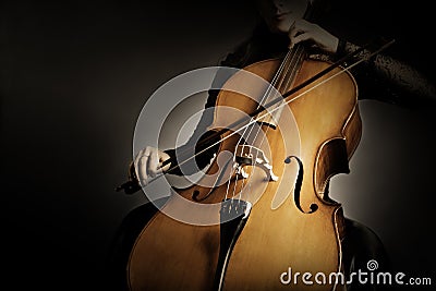 Cello player. Cellist hands playing cello closeup Stock Photo