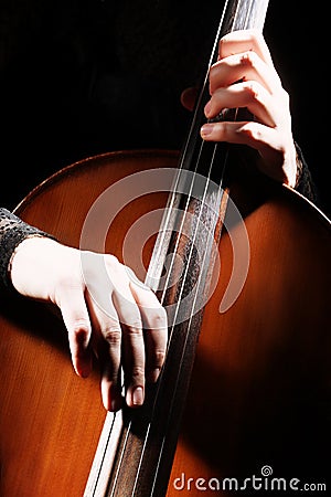 Cello playing hands details Stock Photo