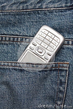 Cellphone in a jeans pocket Stock Photo