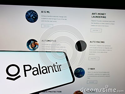 Cellphone with logo of US software company Palantir Technologies Inc. on screen in front of business website. Editorial Stock Photo