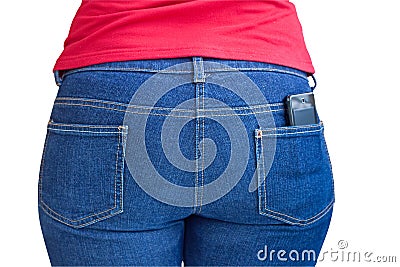 Cellphone sticking out of a jeans pocket Stock Photo