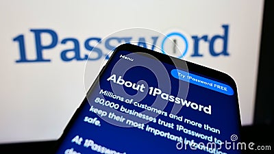 Cellphone with webpage of password manager company AgileBits Inc. (1Password) on screen in front of logo. Editorial Stock Photo