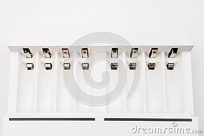 Cells with contacts for charging rechargeable batteries with selective focus and blurred background Stock Photo