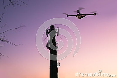 cellular signal tower inspecting drone Stock Photo