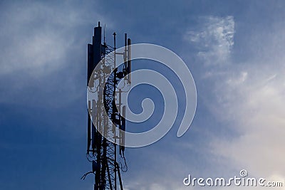 Cellular telecom pole high tower 3G 4G 5G , with blue sky background Stock Photo