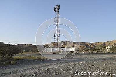 Cellular telecom tower in a remote area of a desert Stock Photo