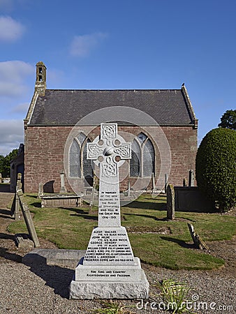 The Celtic Cross War Memorial situated within the Graveyard of Stracathro Parish Church in Angus. Editorial Stock Photo