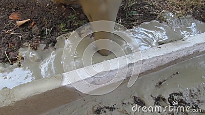 Cementing Curbs with a Liquid Mortar Stock Video - Video of building