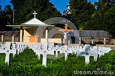 A cemetery or gravesite for the dead people to be buried. Holy graveyard of Christian people, crosses of the burial ground place Editorial Stock Photo