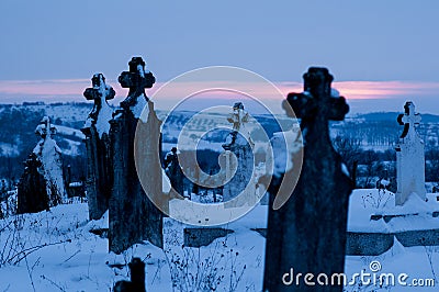 Cemetery, Graveyard with Tombstones Winter at Dawn Stock Photo