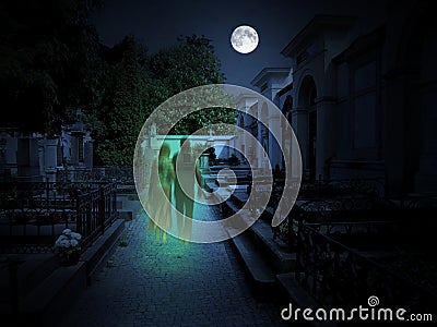 Cemetery with two ghosts in the moonlight Stock Photo