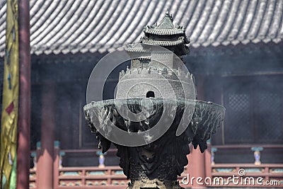 The censer in front of the chinese temple. Stock Photo