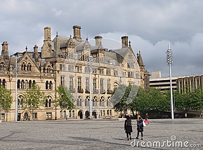 centenary square in bradford west yorkshire with people walking past the city hall and magistrates court buildings Editorial Stock Photo