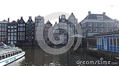 Dutch capital and typical houses on the river Editorial Stock Photo