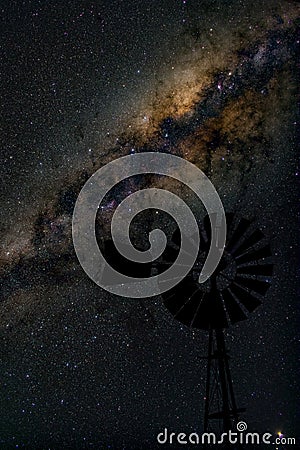 Center of Milky way galaxy with windmill in foreground Stock Photo