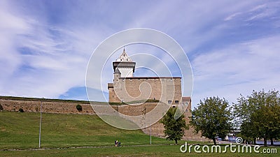 Narva fortress on the south side: fortress wall, castle, Long Herman tower. Stock Photo