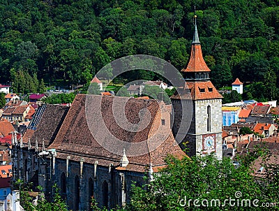 Center of the old town of Brasov City Black Church Transilvania, Romania. In background you can see Tampa mountain 955 m Editorial Stock Photo
