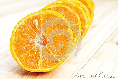 Center (Selected focus) of orange half which is the first of lin Stock Photo