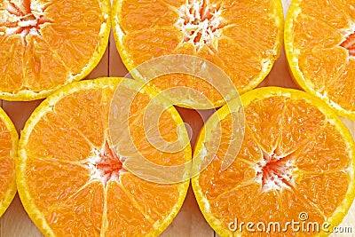 Center (Selected focus) of orange half which is at left below si Stock Photo