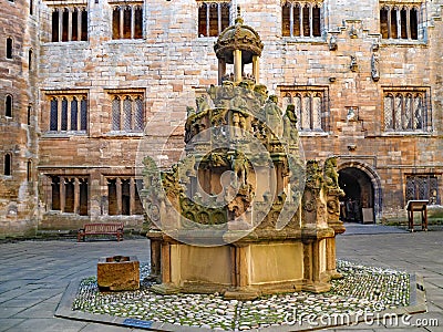 The central courtyard of Linlithgow Palace contains an ornate fountain Editorial Stock Photo