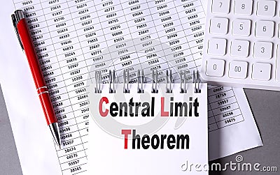 CENTRAL LIMIT THEOREM text on notebook with chart , pen and calculator Stock Photo