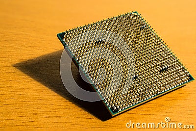 Central processing unit CPU microchip with golden pins Stock Photo