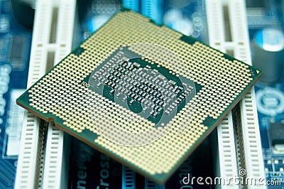 Central processor unit CPU chip over slots on computer motherboard Stock Photo