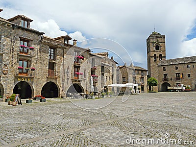 Central square and medieval church of Ainsa Huesca Editorial Stock Photo