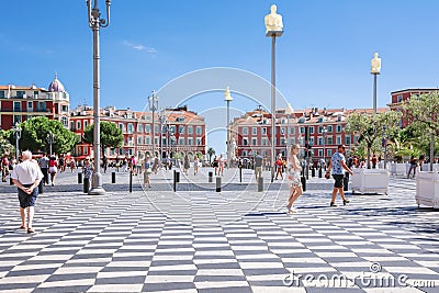 Nice, Provance, Alpes, Cote d`Azur, French,August 15, 2018; A view of the place Massena square. Tourists are walking around square Editorial Stock Photo