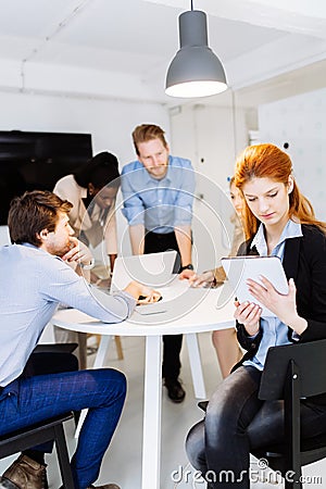 CEO of company holding tablet Stock Photo