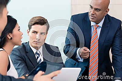 CEO explaining his vision in business meeting Stock Photo