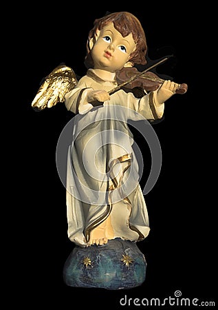 Ceramic angel playing violin Stock Photo