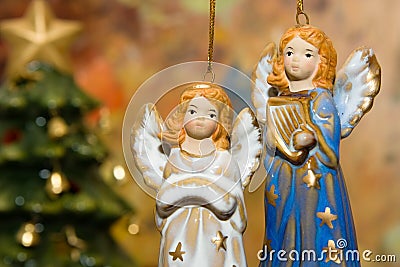 Ceramic angel toys and christmas tree Stock Photo