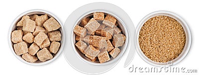 Ceramic bowl plates of natural brown refined sugar and sugar cubes on white background Stock Photo