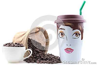 Ceramic Coffee Mug is a female drawing placed with coffee beans. Stock Photo