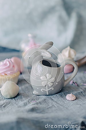 Ceramic Cup - bunny and beautiful dessert Stock Photo