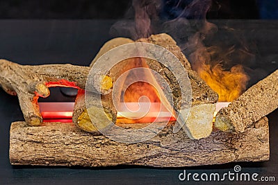 Ceramic Logs Fireplace Stock Photo