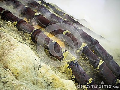 Ceramic Pipes Used for Sulfur Mining at Kawah Ijen Volcano Stock Photo