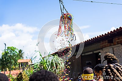 Ceramic pot hanging from a rope to be broken by people participating in the game. Traditional northeastern Brazilian custom Editorial Stock Photo