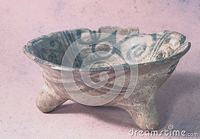 Ceramic pre-Columbian dish from unidentified ancient Peruvian culture. Piece of pre-Inca fired and painted pottery made by the Stock Photo
