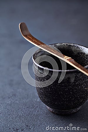 Ceramic tea cup and Chashaku Matcha spoon. Symbolic image. Asian culture. Stock Photo