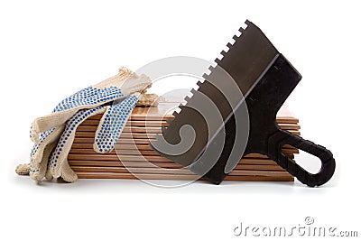 Ceramic tiles and trowel for repairs Stock Photo