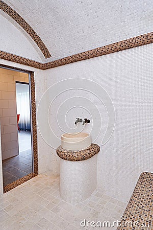 Ceramic washbasin with two taps in the hammam Stock Photo