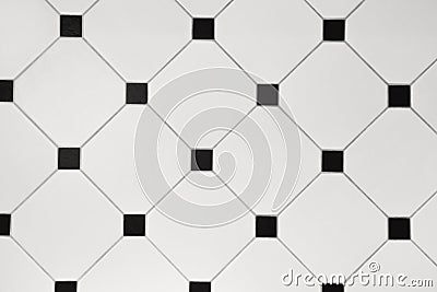 Ceramic white octagon with tessellation black tiles background Stock Photo