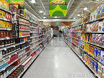 The cereal, coffee and tea aisle at a Publix grocery store in Orlando, Florida Editorial Stock Photo