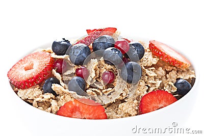 Cereals bowl with red fruits isolated on white Stock Photo